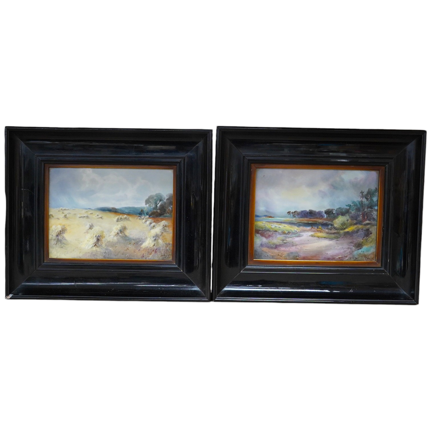 A pair of Royal Crown Derby painted porcelain ‘landscape’ plaques, painted by Cuthbert Gresley, overall 27 x 32cm. Condition - good